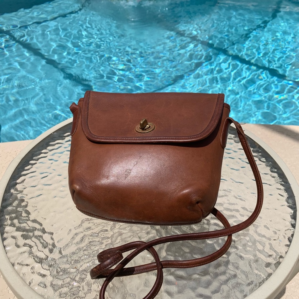 Vintage Carmel colored Coach crossbody.